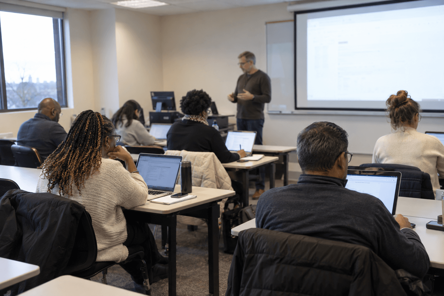 Illustrative scene of professionals learning together in a live group