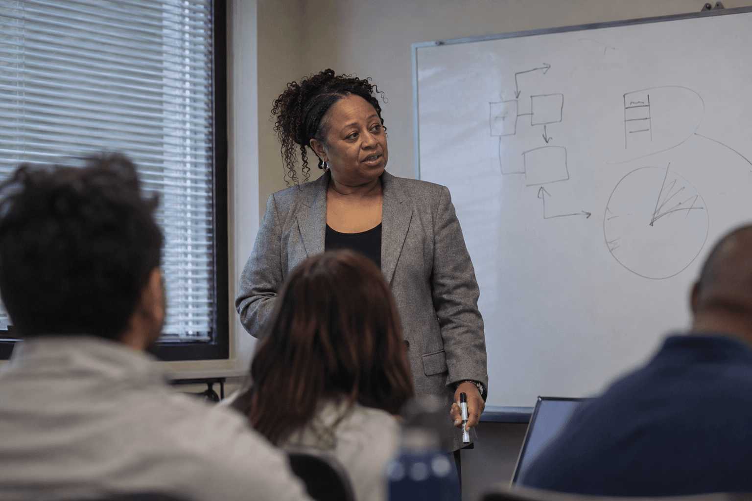 Illustrative scene of an educator leading a professional seminar